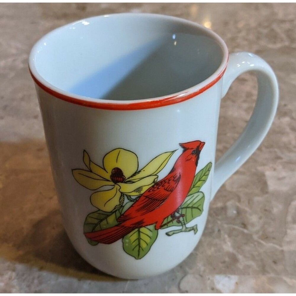 Red Cardinal On Branch With Yellow Flower Mug